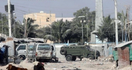 Gunfire erupts in Mogadishu as Somali government forces seal off streets